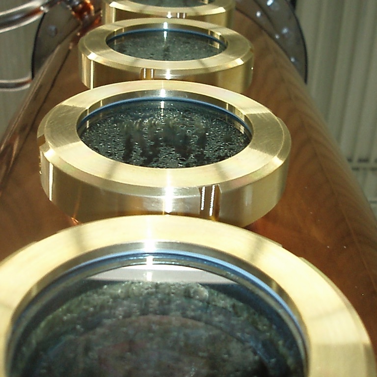 Sight glasses along the copper distillation system